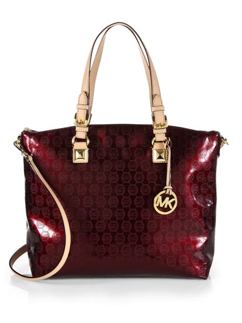 michael kors rouge bordeaux vs poupre|michael kors leather bags review.